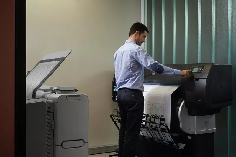 HP Designjet T7200 being used in an office